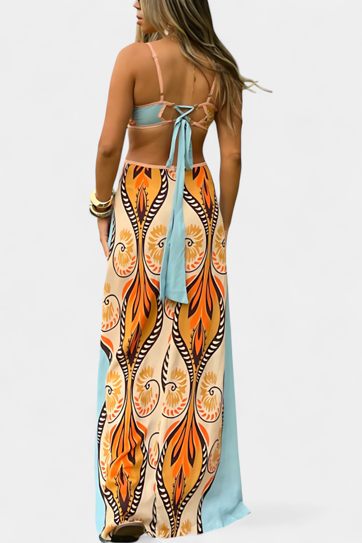 Sytella - Cut-Out Jurk met Abstracte Print en Ontblote Rug