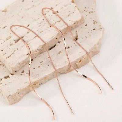 Lange oorbellen met golvend ontwerp